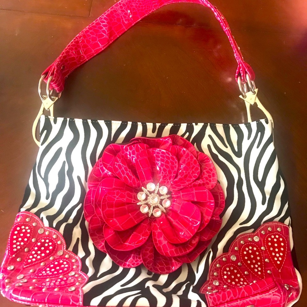 Hot pink and zebra stripped bling purse. Brand new